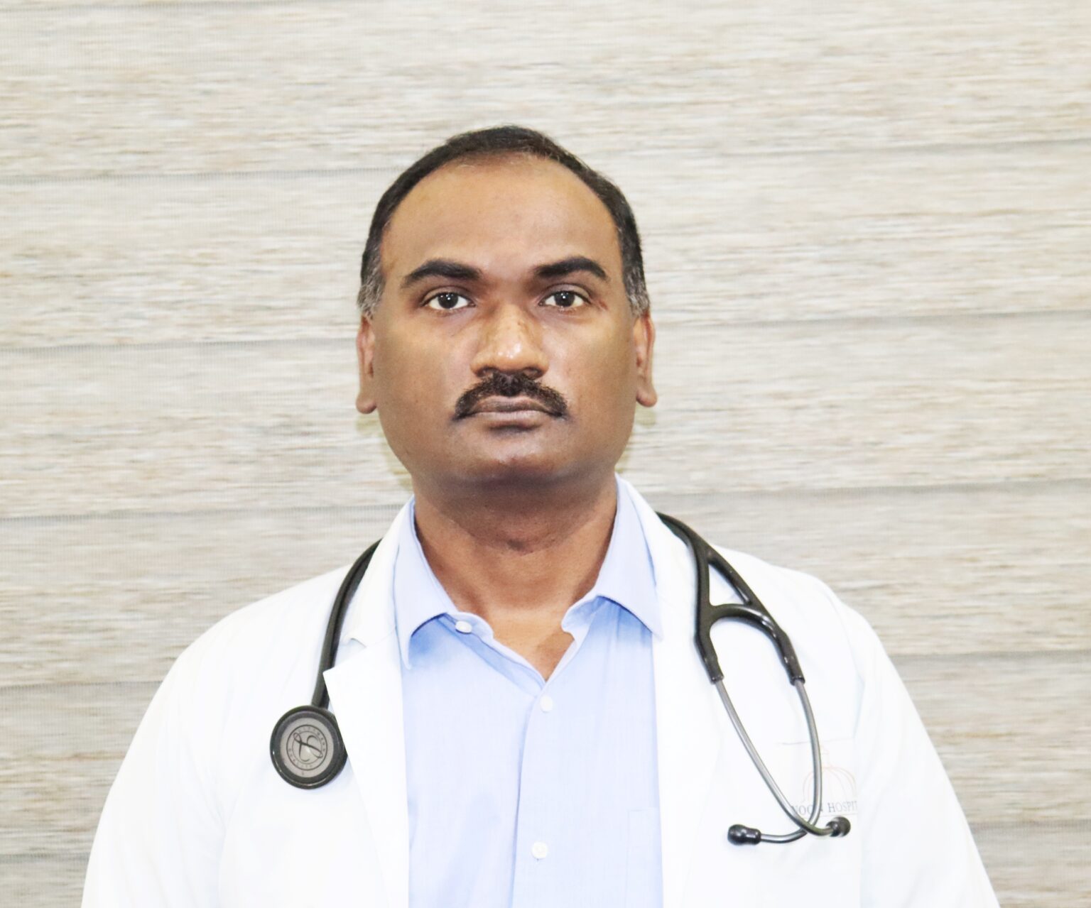 Dr Likesh Nandawar